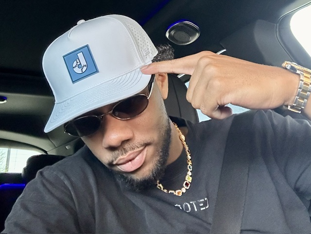 Hunter Greene wearing a Dukes hat